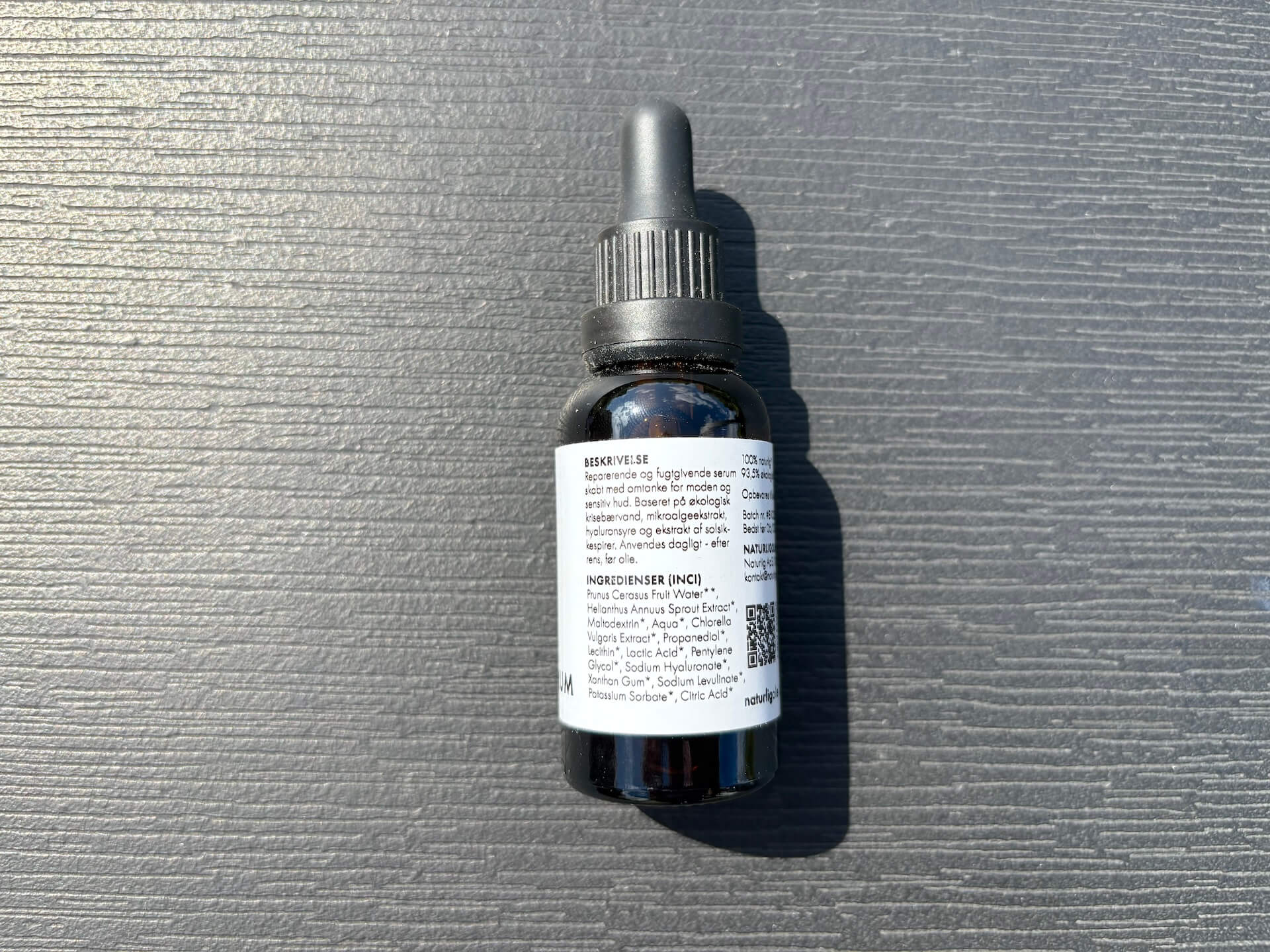 Anvendelse vise på flaske med Naturligolie Økologisk Pro-Age Serum