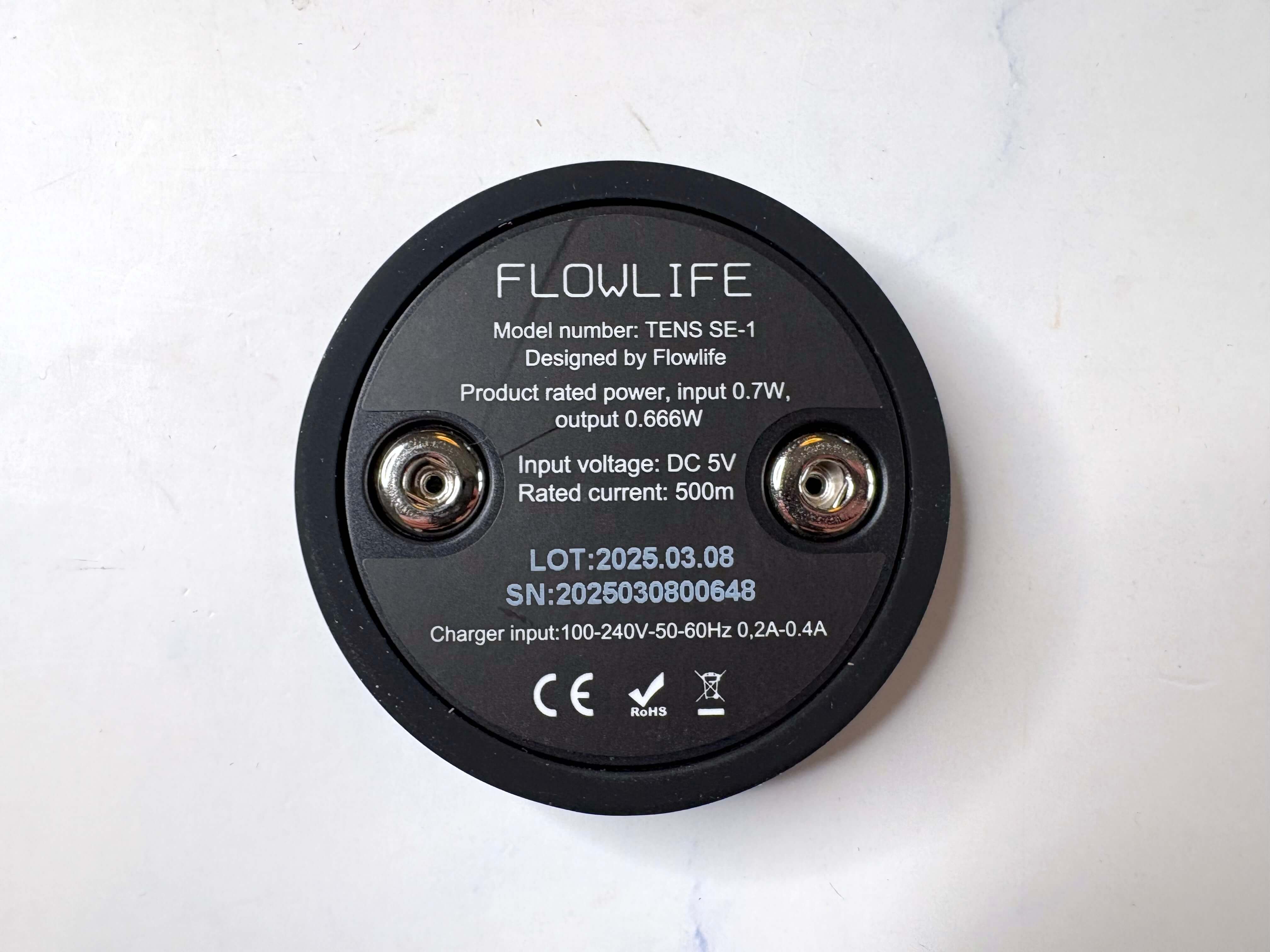 Bagside af batteri til Flowlife Flowtens Connect