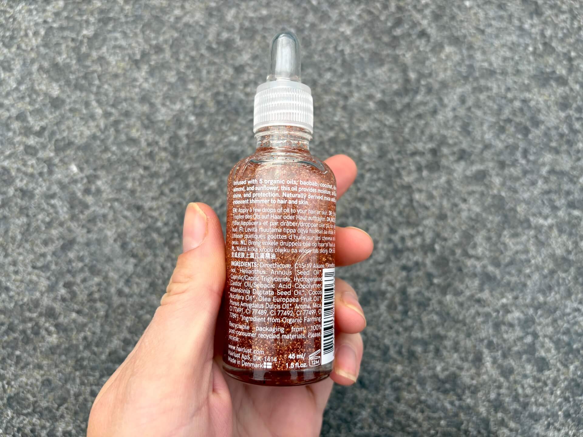 Bagside af Hairlust Final Touch Shimmering Oil