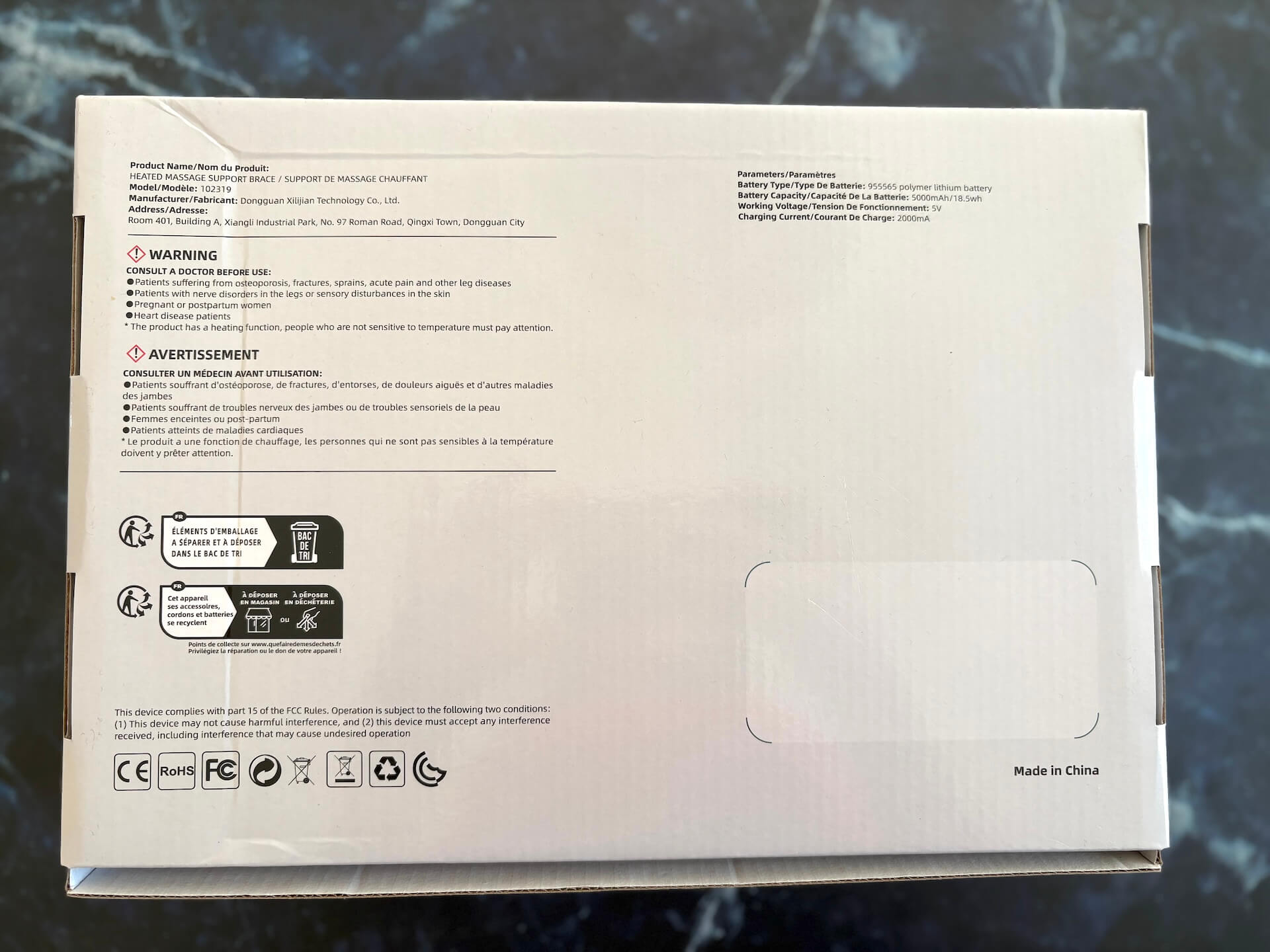 Bagside af kasse med DeluxeCare HeatCare