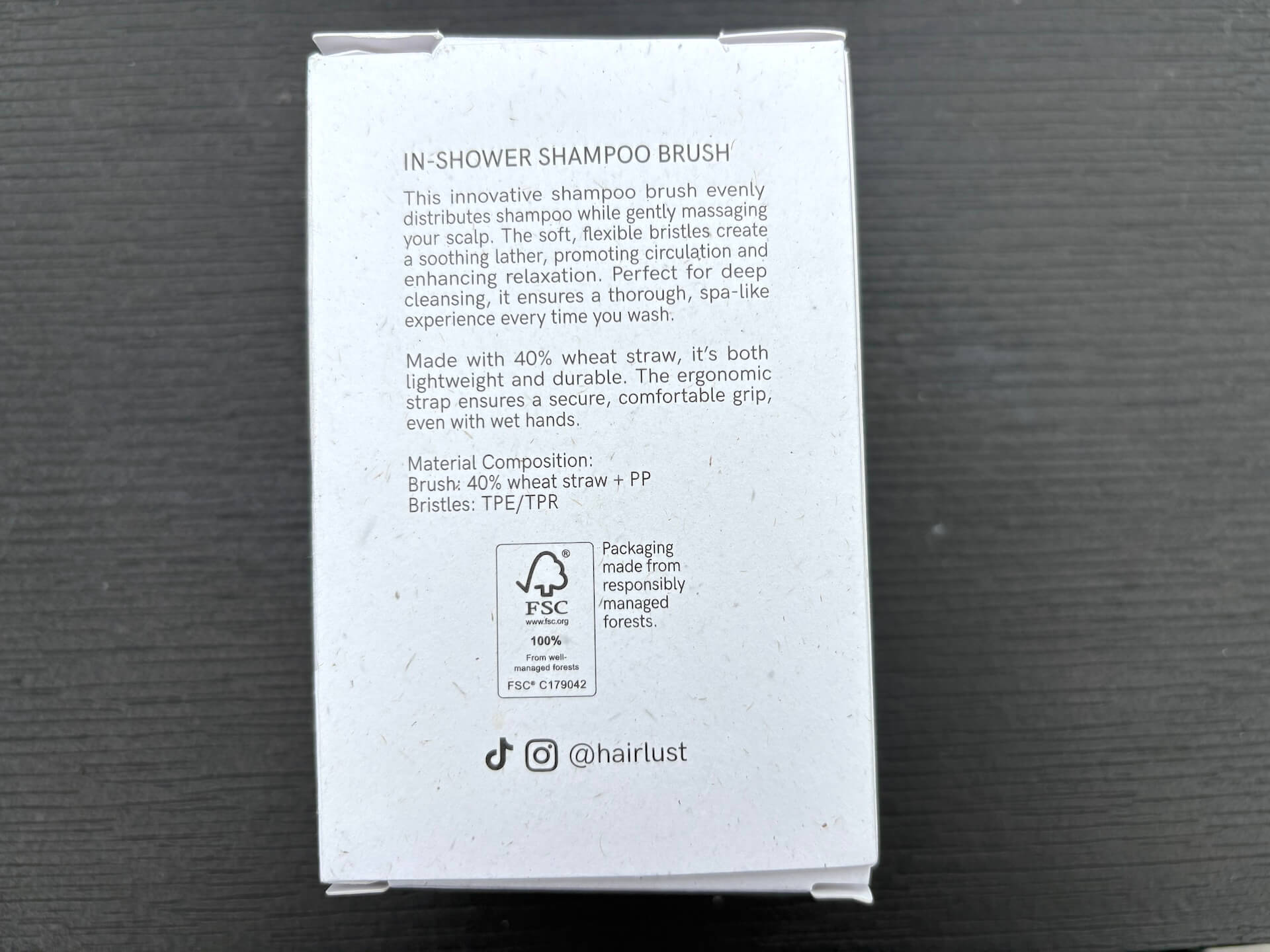 Bagside af kasse med Hairlust In-Shower Shampoo Brush