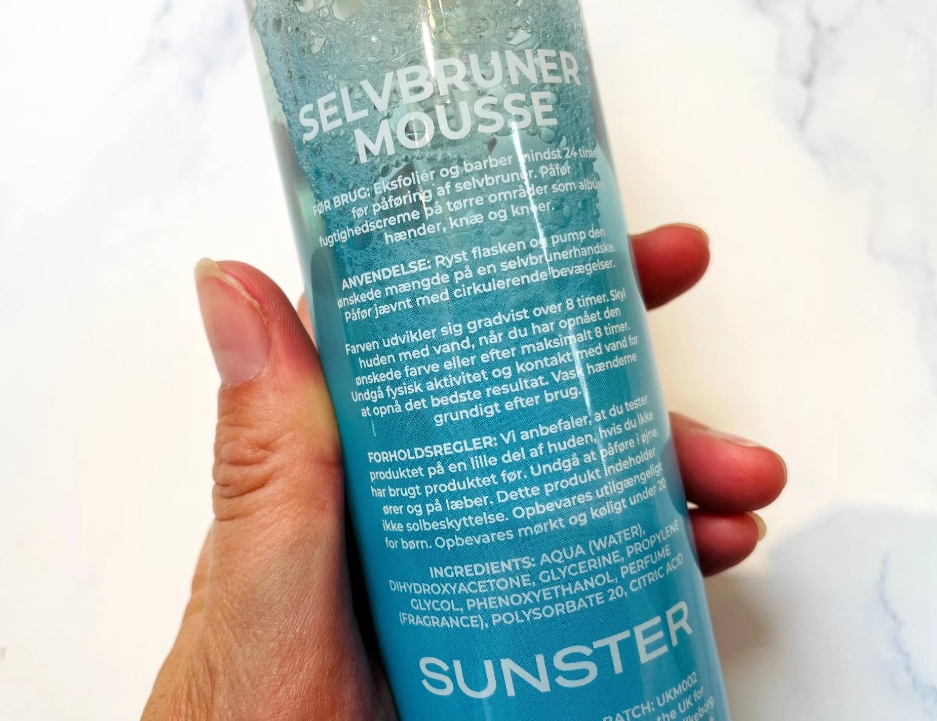 Bagside af Sunster selvbruner mousse