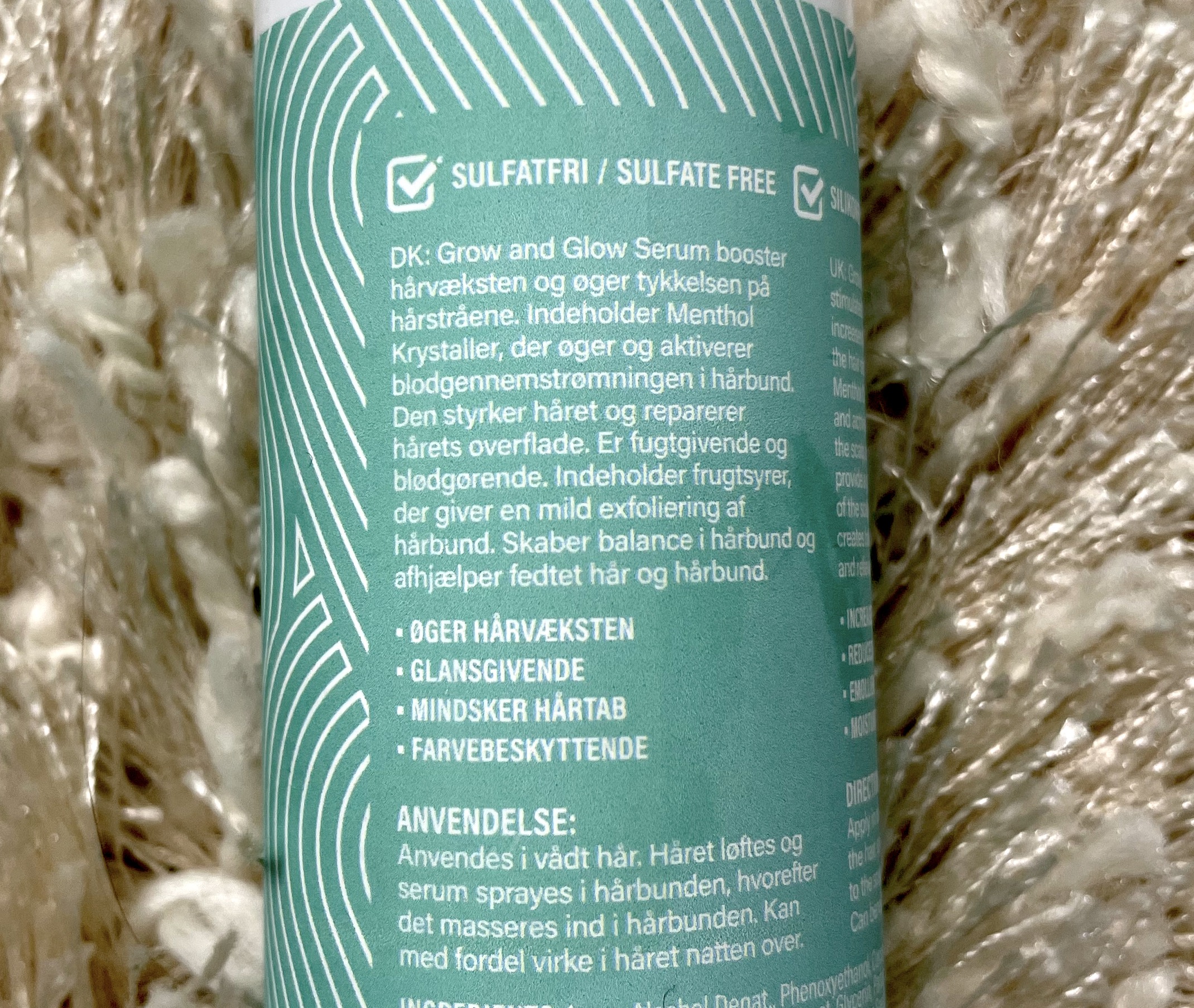 Bagside af Yuaia Haircare Grow and Glow hårvækstserum