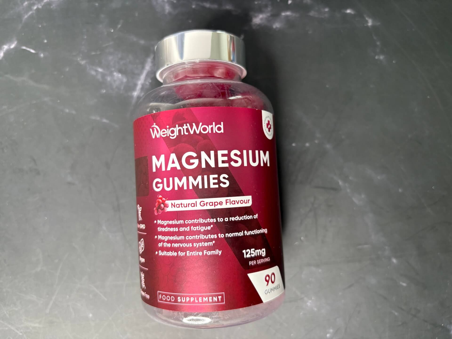 Bøtte med WeightWorld Magnesium Gummies på bord