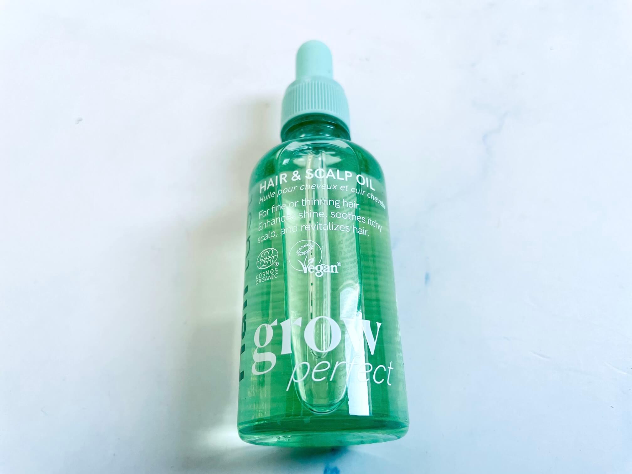 grow perfect hovedbundsolie fra Hairlust på bord