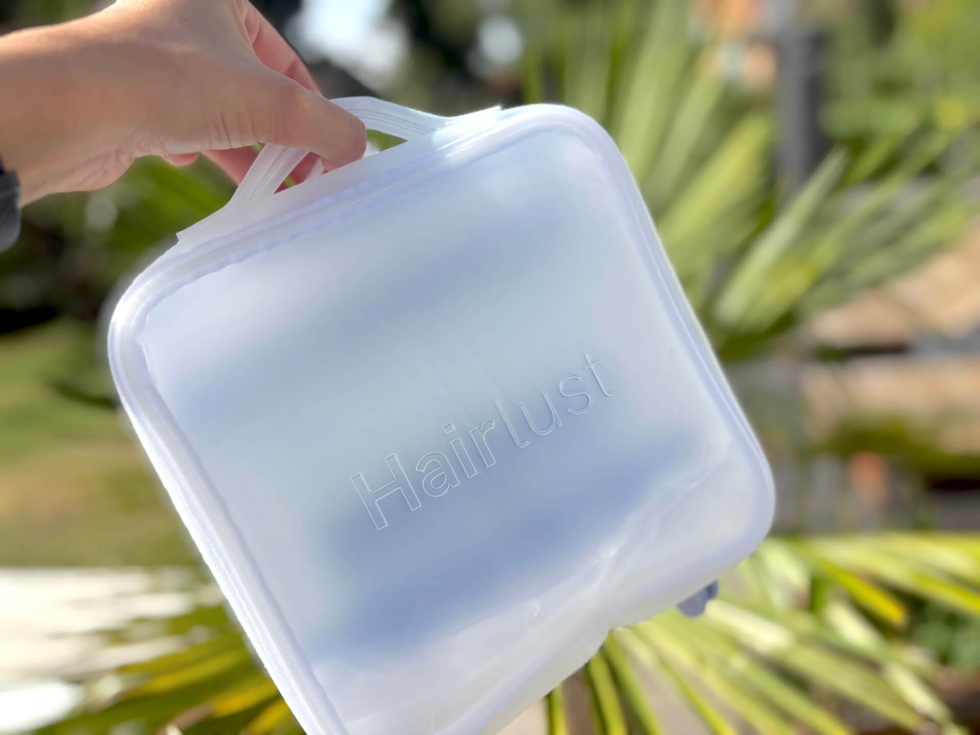Håndtag på Hairlust Hanging Travel Toiletry Bag