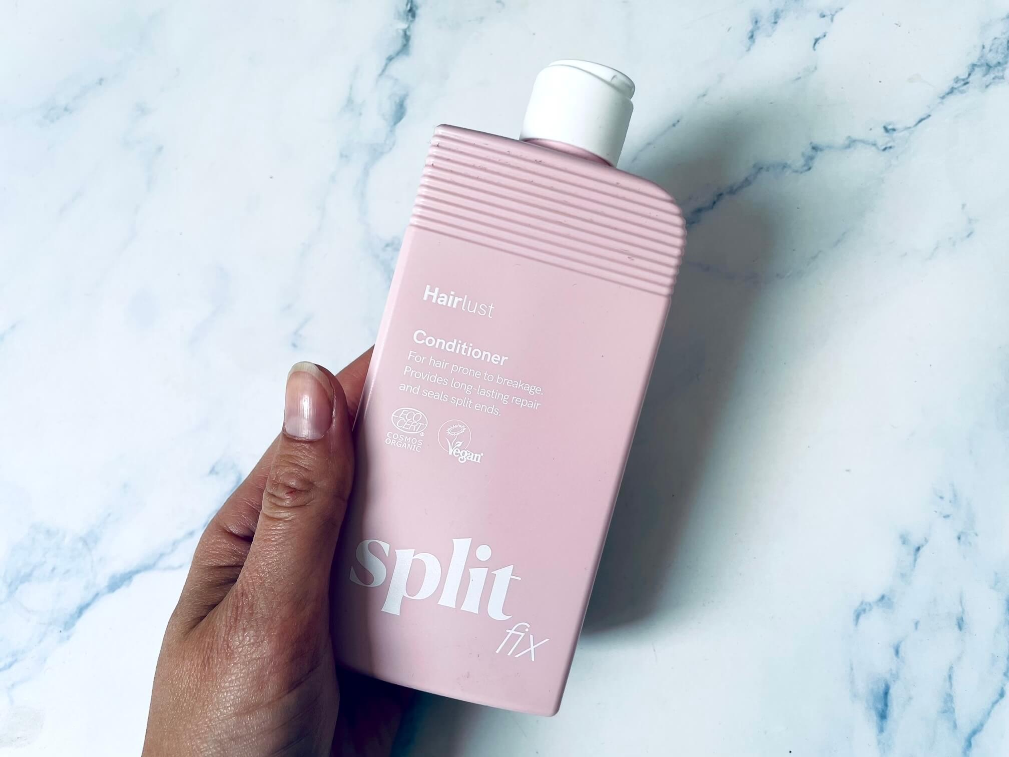 Hairlust Split Fix conditioner i hånd