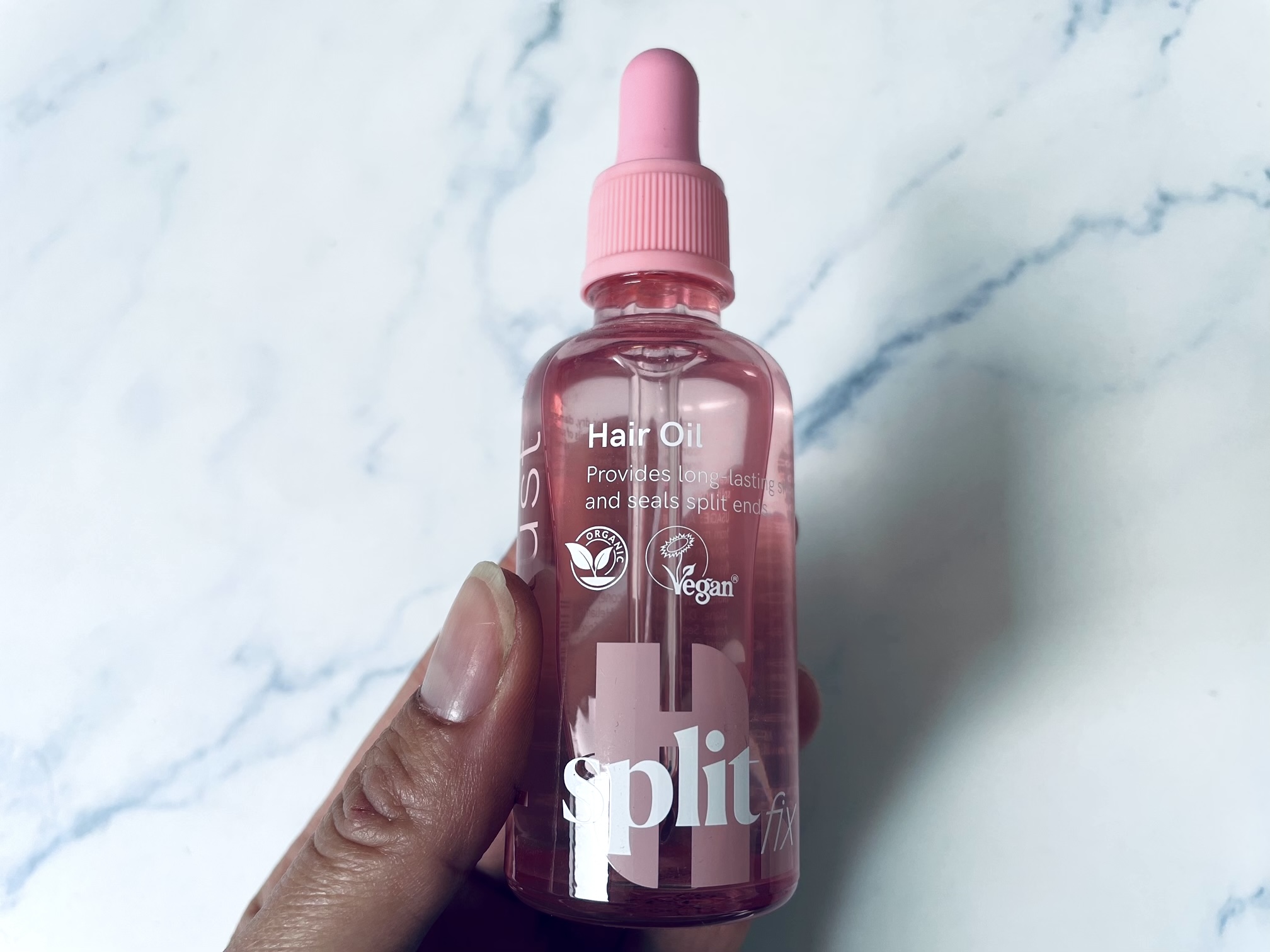 Hairlust Split Fix hair oil i hånd