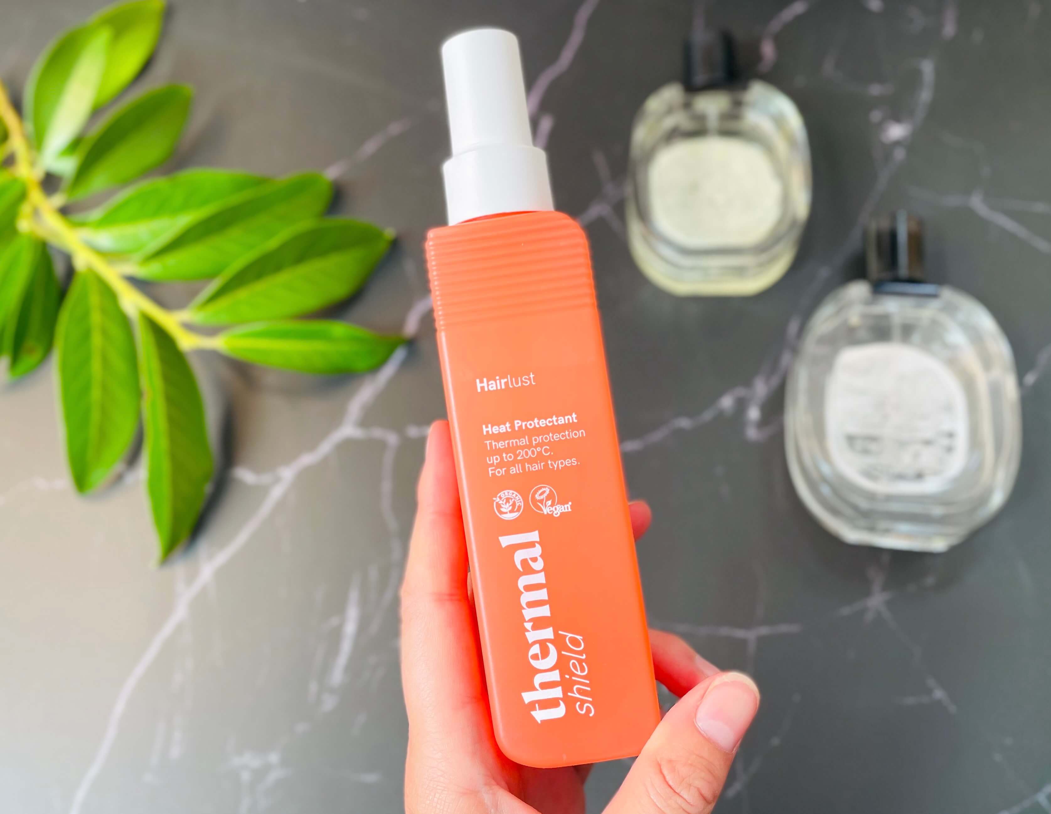 Hairlust Thermal Shield Heat Protectant i hånd