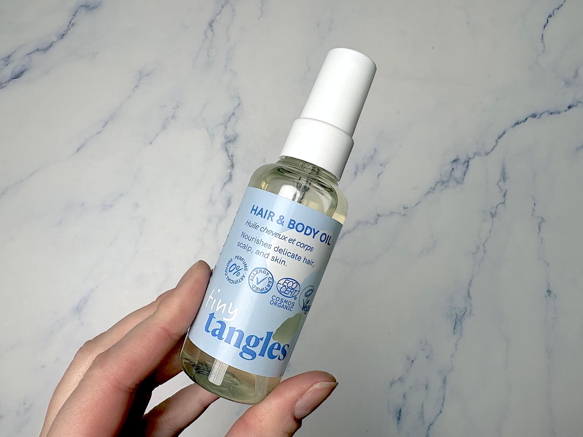 Hairlust Tiny Tangles Hair & Body Oil i hånd