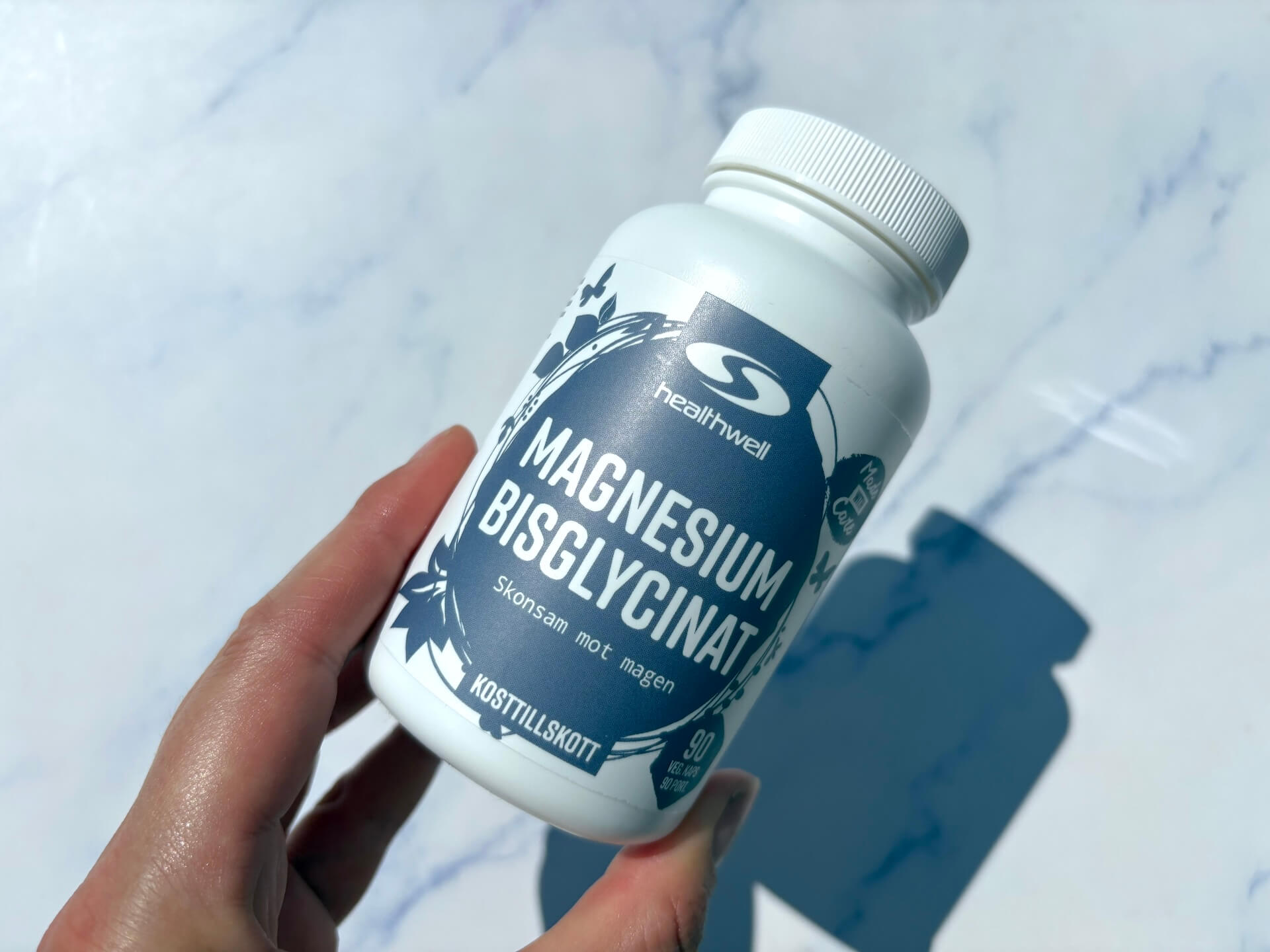 Healthwell Magnesium Bisglycinat i hånd