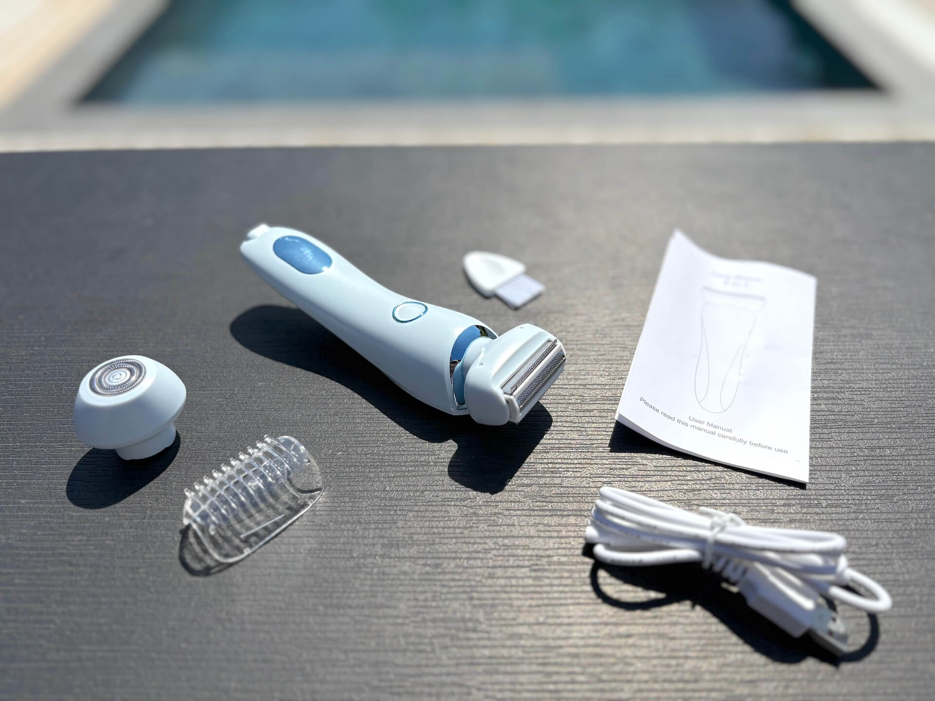 Indhold fra kasse med SkySkin Ladyshaver