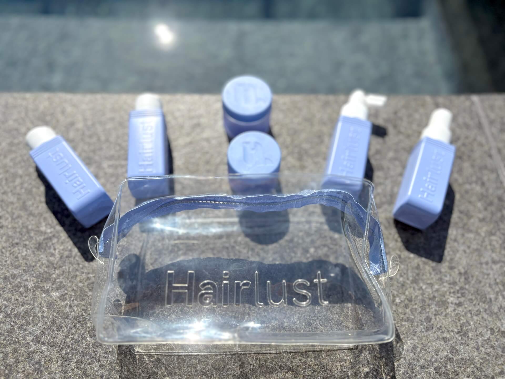Indholde fra Hairlust Refillable Travel-Size Bottles toilettaske