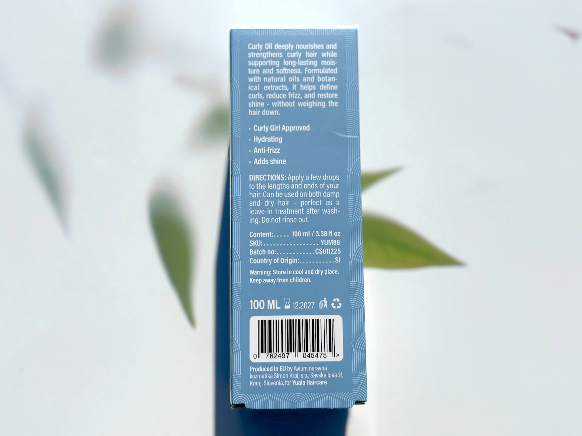 Info på Yuaia Haircare Twirl and Curl Curly Oil kasse
