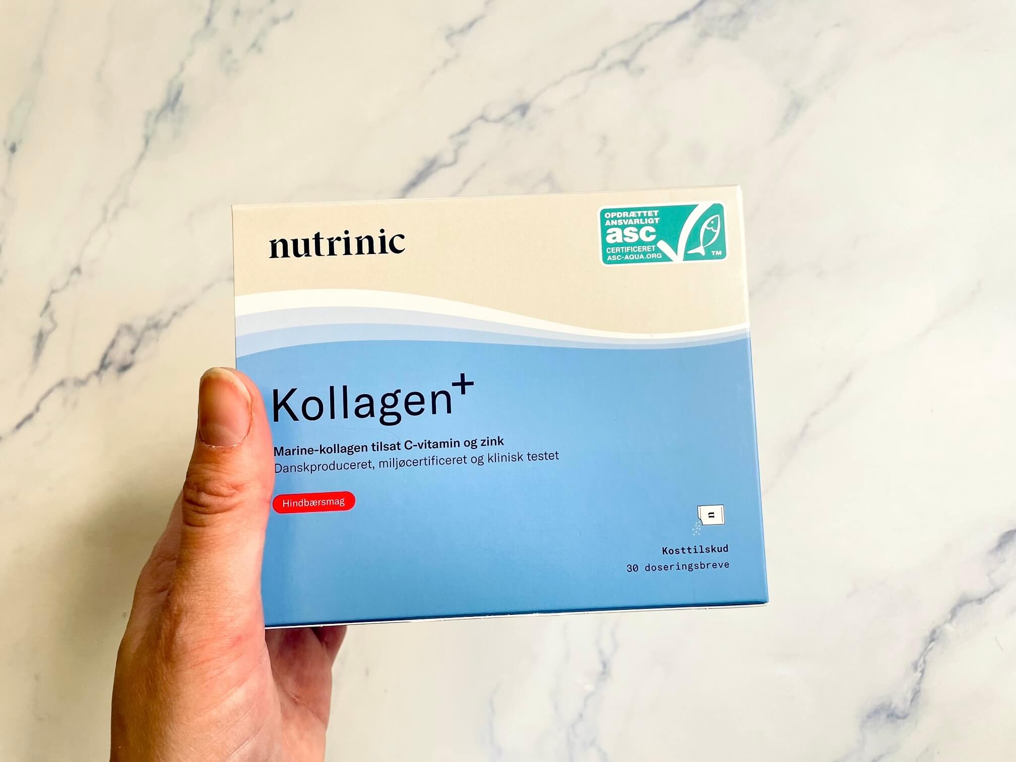 Kollagen+ med hindbærsmag fra Nutrinic i hånd