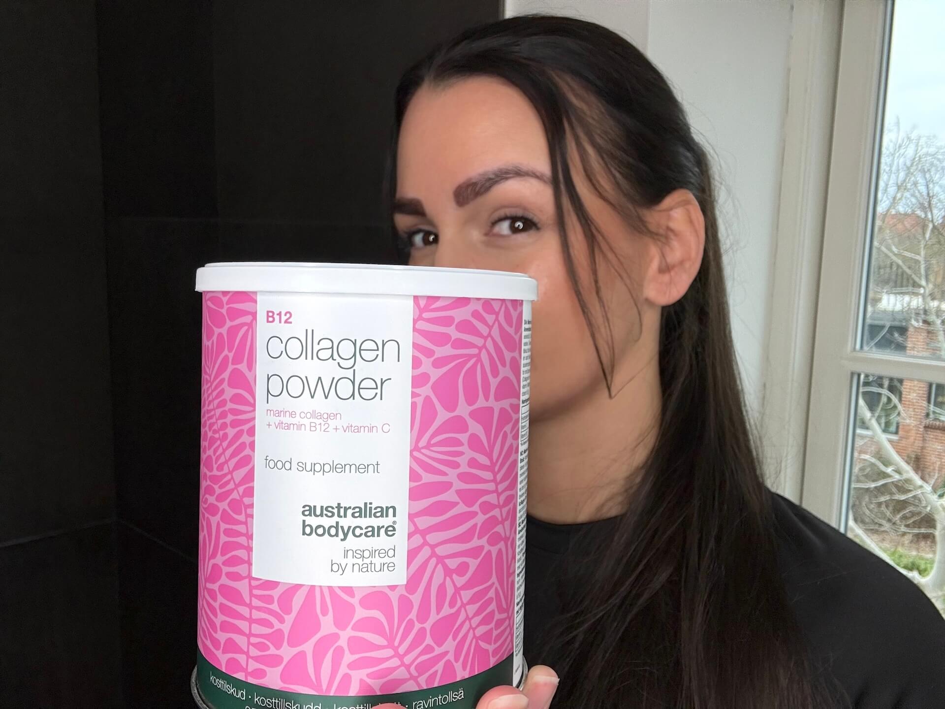 Kvinde der står med Australian Bodycare B12 Collagen Powder