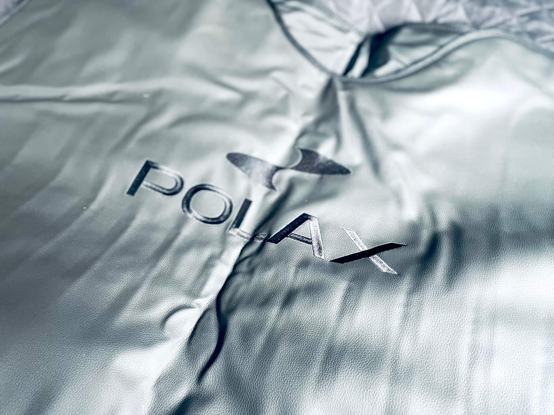 Logo på Polax Premium Infrarødt Saunatæppe
