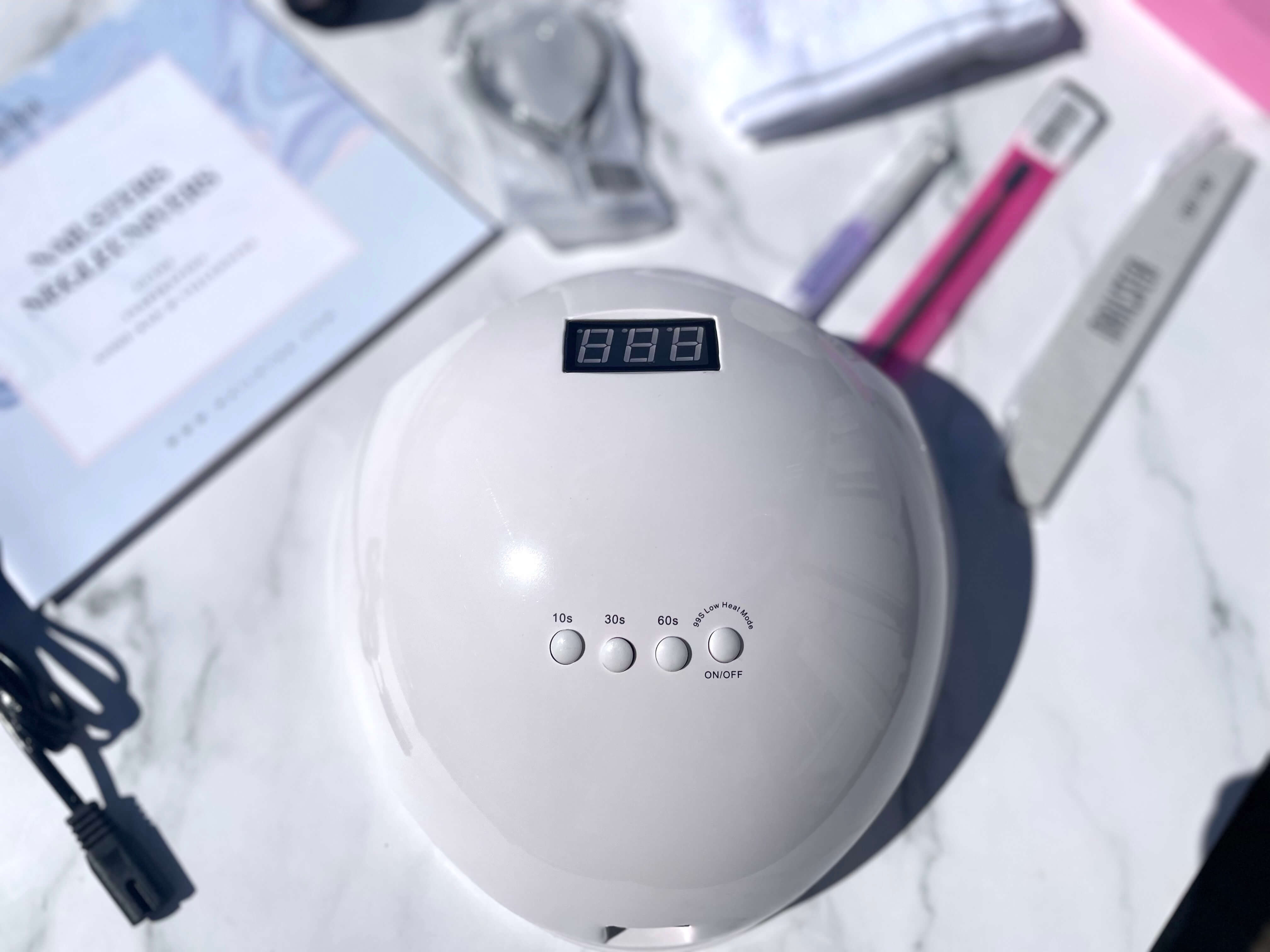 Nailster Professional gellak lampe med produkter foran