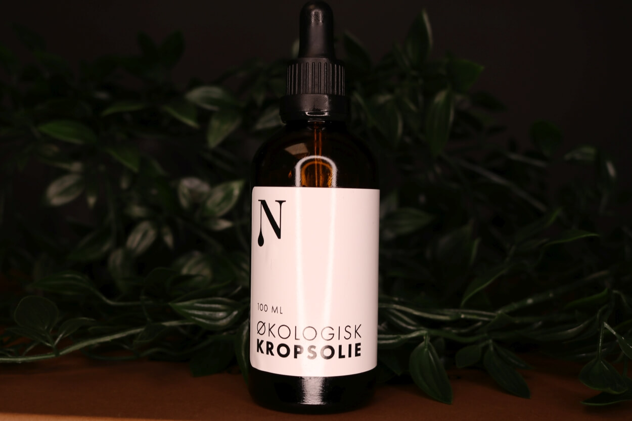 Naturligolie kropsolie foran plante