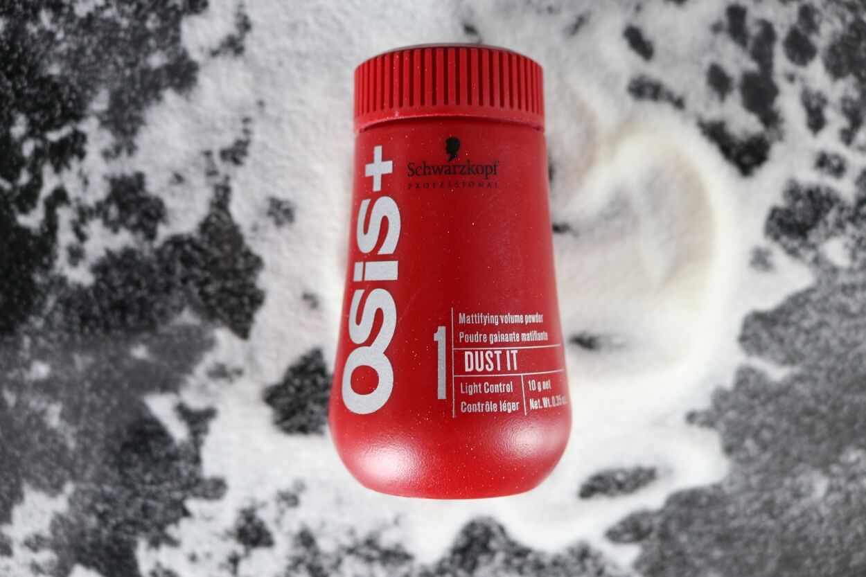 Osis Dust It hårpudder på bord med hårpudder