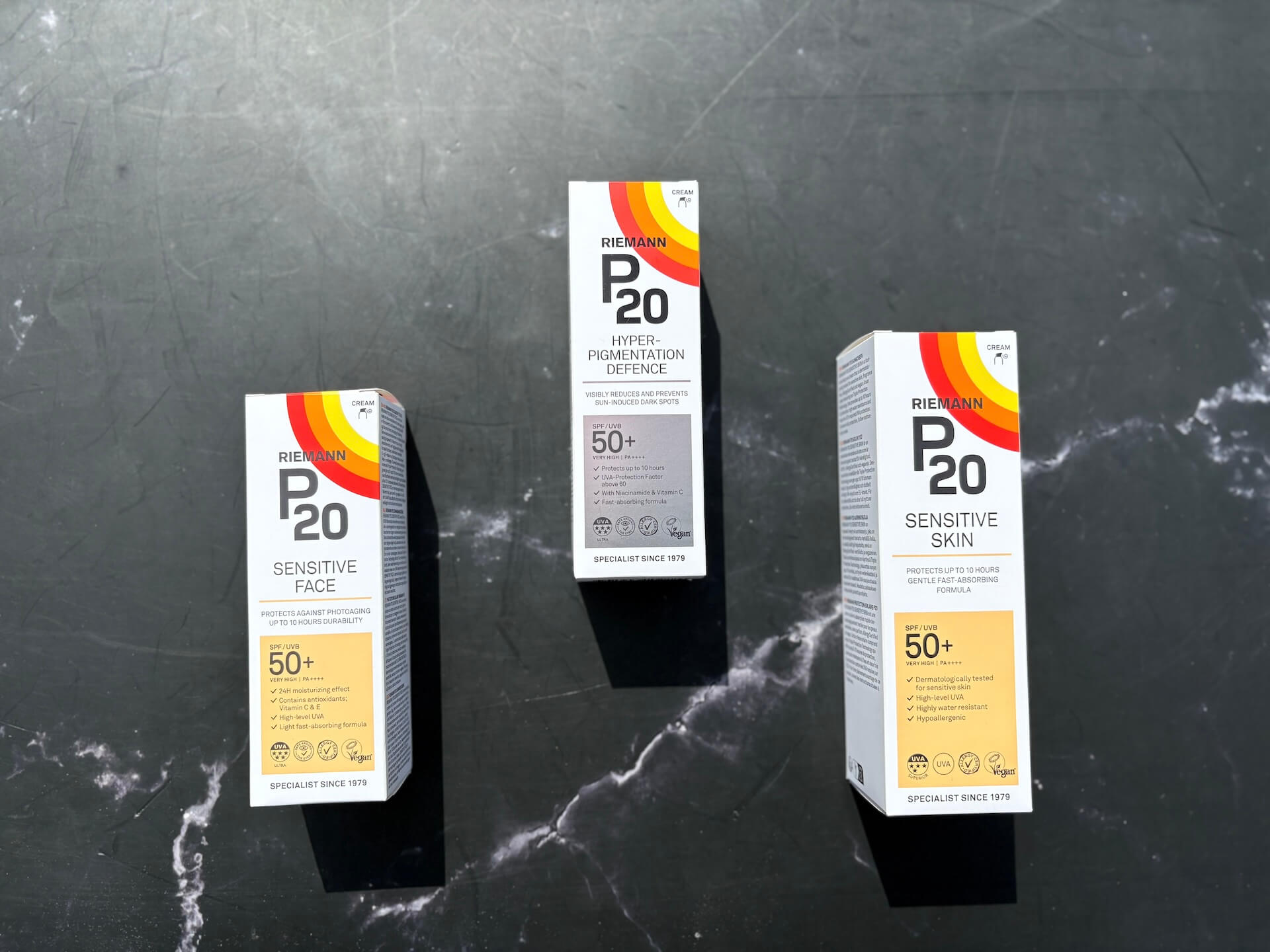 P20 Riemann Hyperpigmentation Defence SPF 50+ og to andre fra P20 på bord