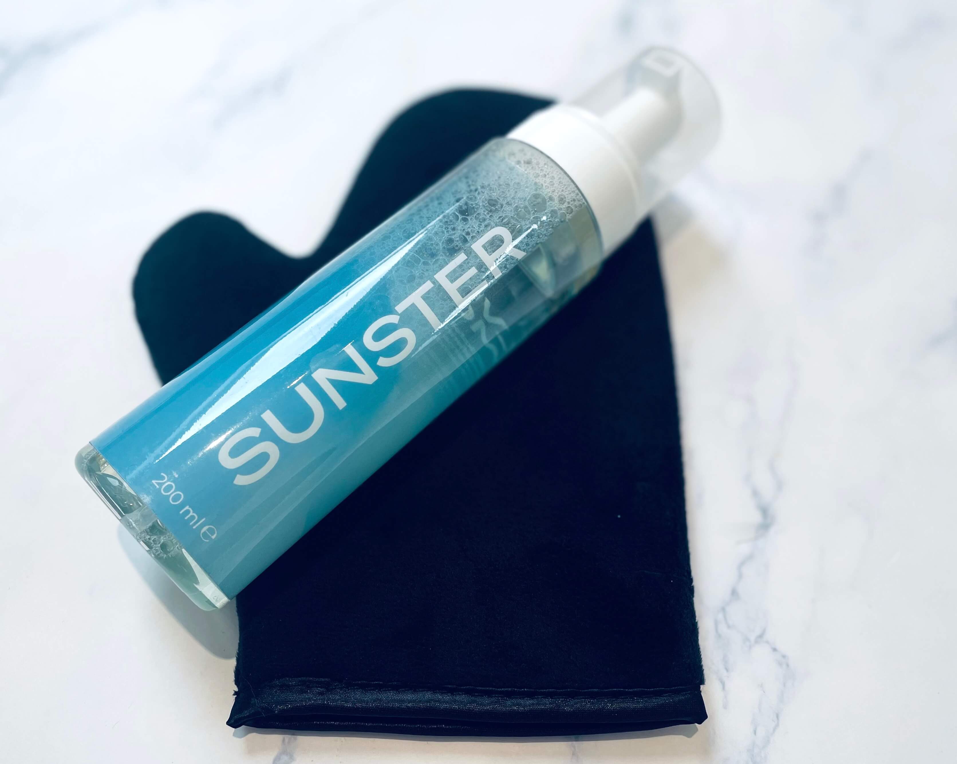Sunster selvbruner mousse på handske til påføring