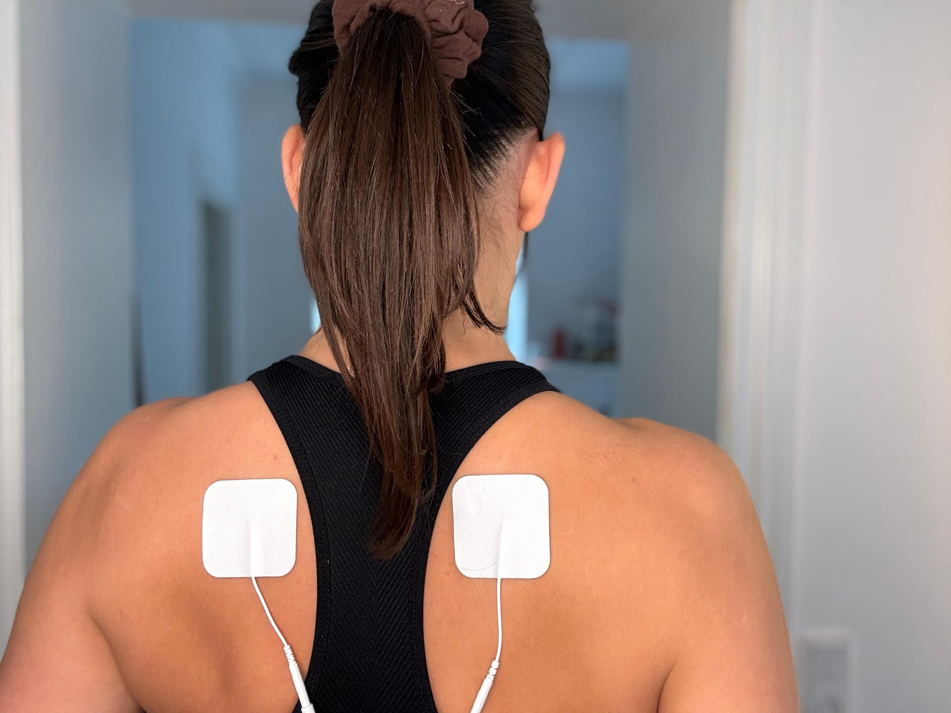 SweHealth SweTens Pocket bruger på ryg