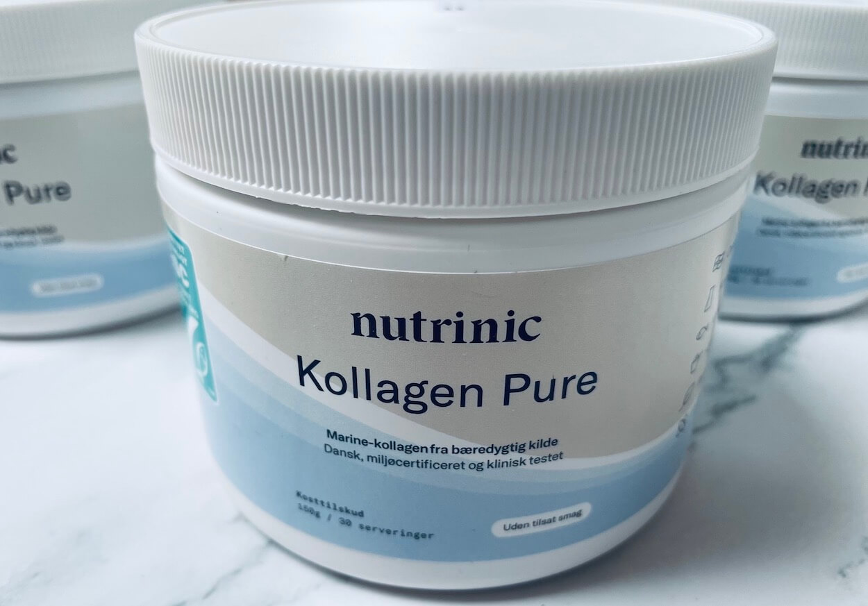 Tre bøtter med Nutrinic Kollegan Pure på et bord