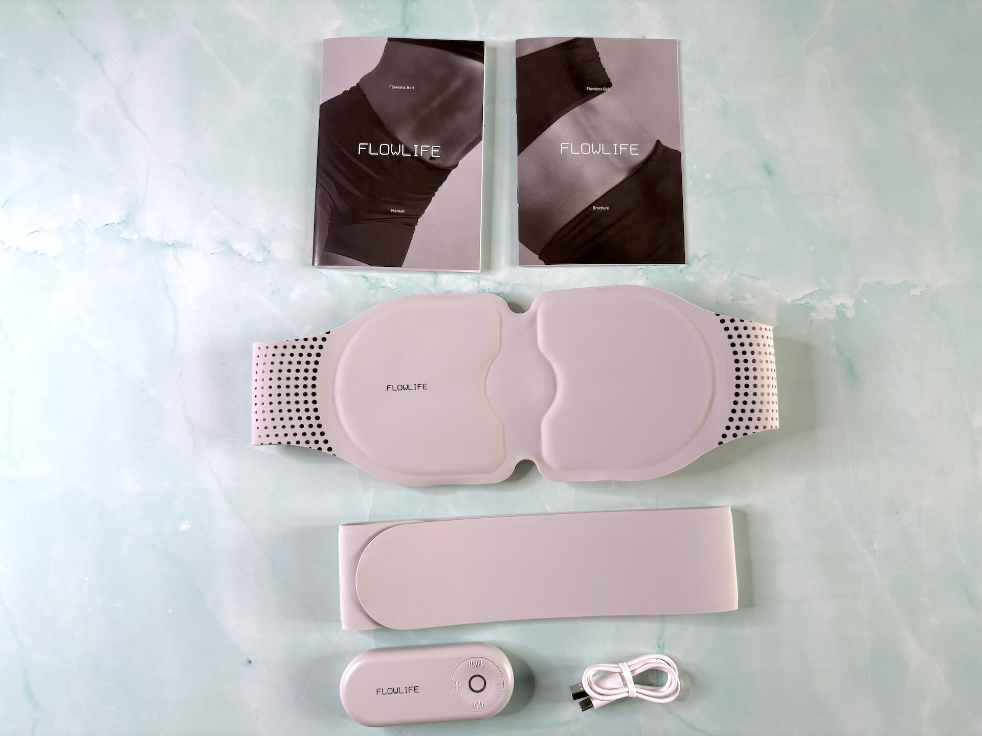 Unboxet indhold fra Flowlife Flowtens Belt
