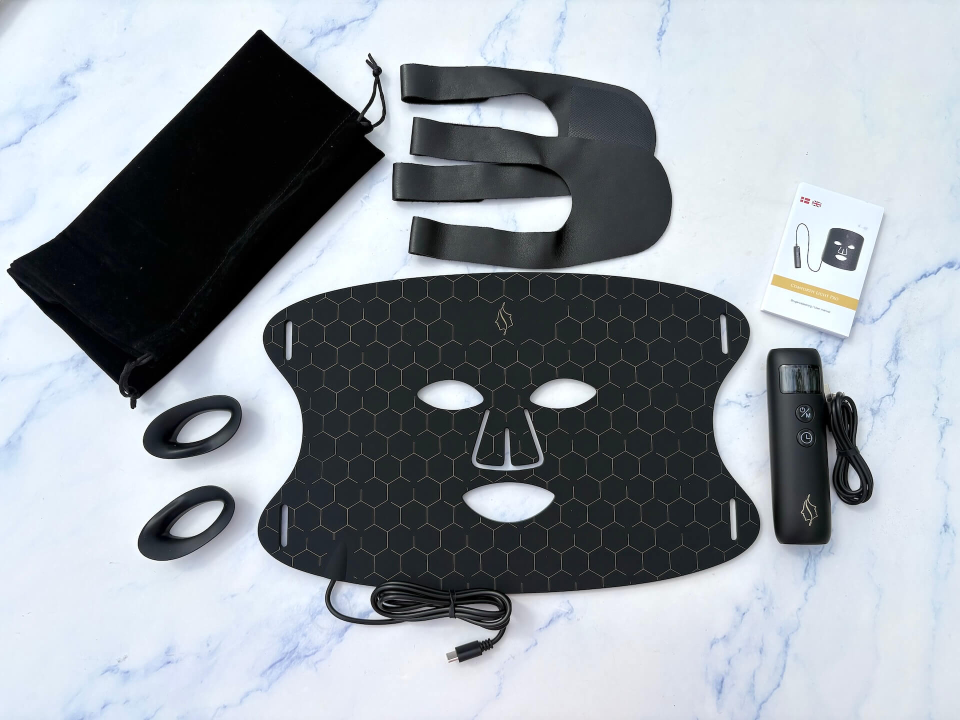 Usamlet Comforth Light Pro led maske på bord