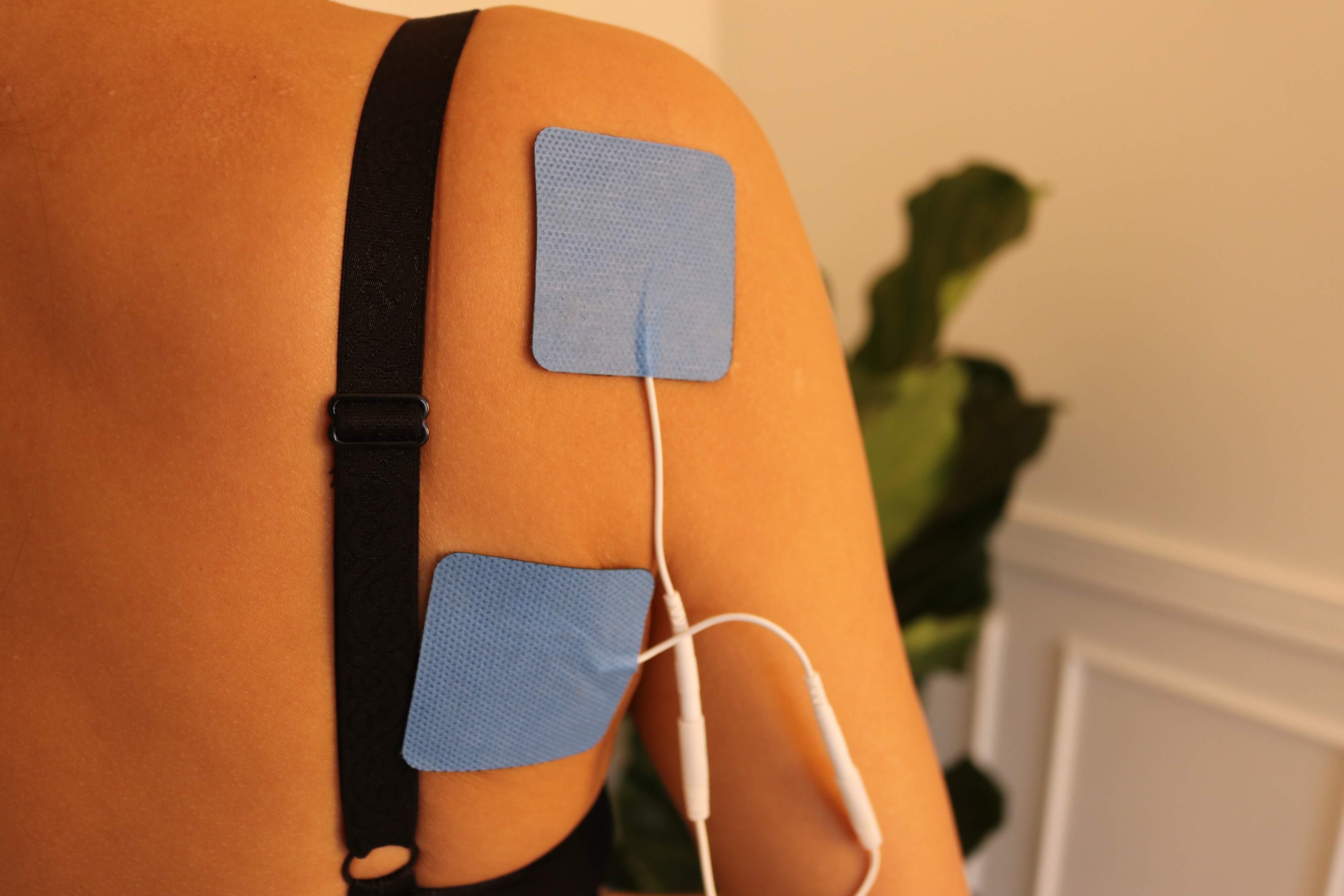 Weightworld cirkulationstræner elektroder på en ryg