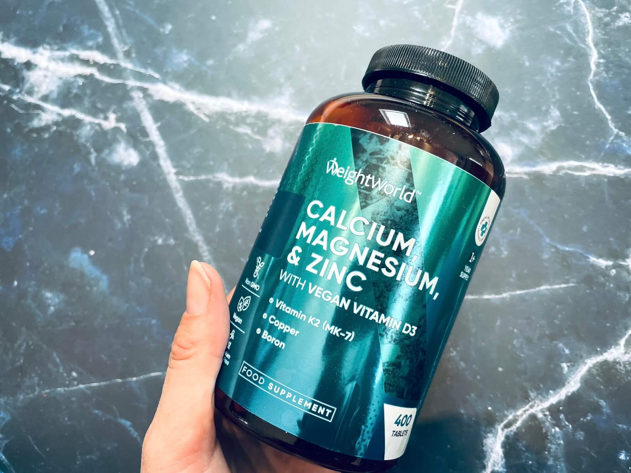 Weightworld kalktabletter i hånd