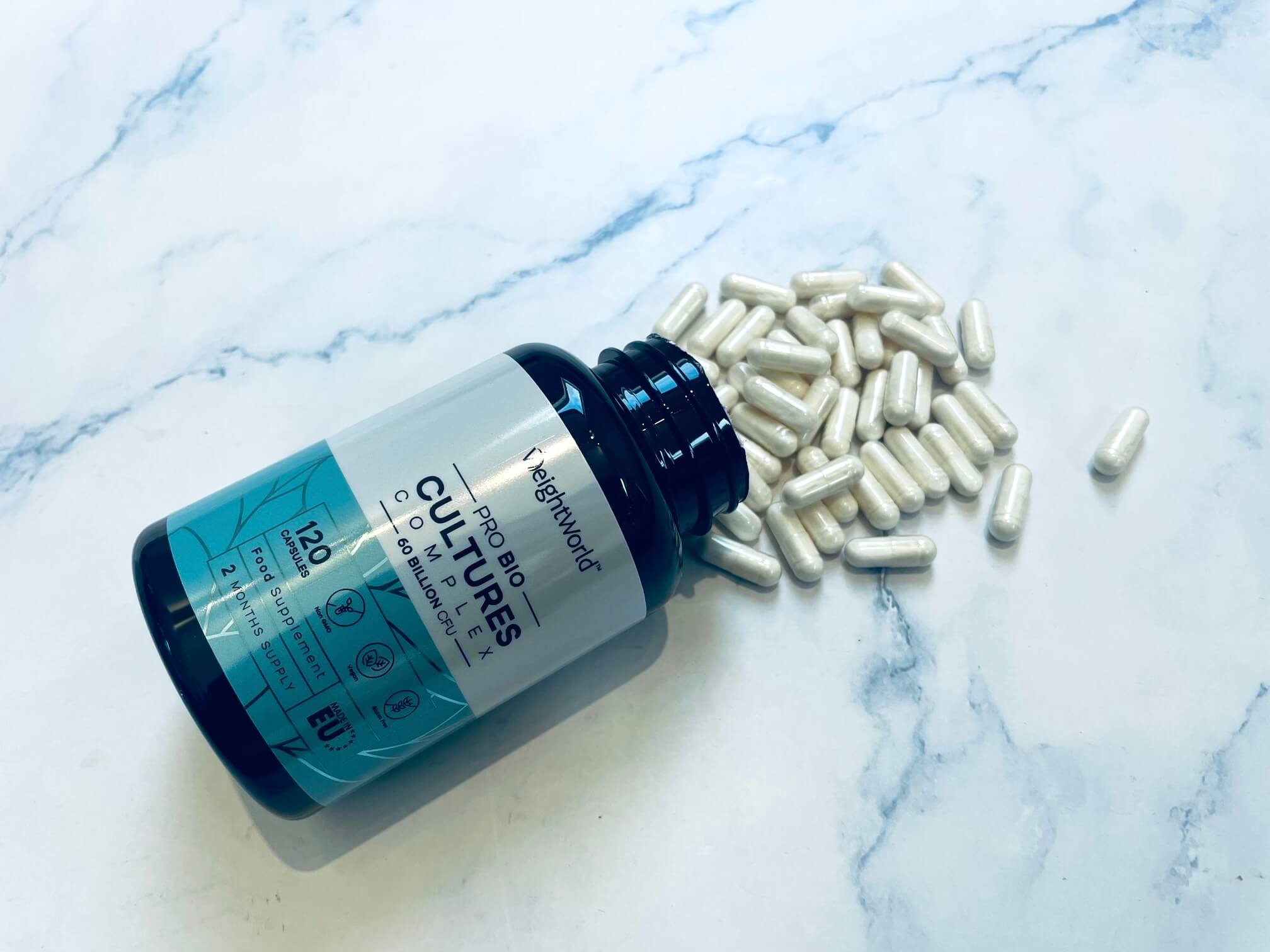Weightworld mælkesyrekapsler på et bord