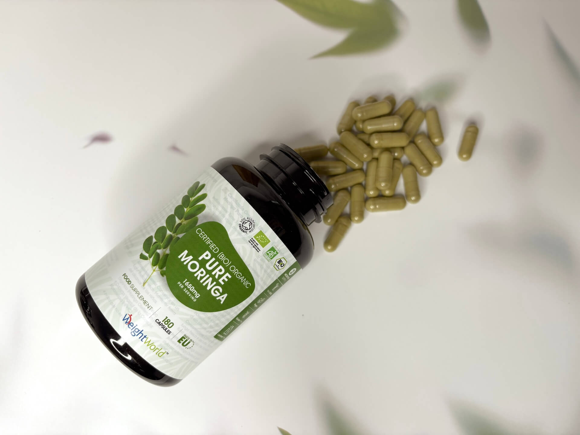 WeightWorld Pure Moringa kapsler og bøtte på bord
